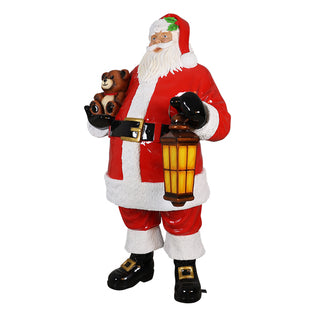 Santa Claus Holding Bear And Lantern