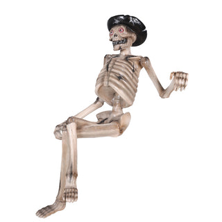 SKELETON SITTING ON A BENCH